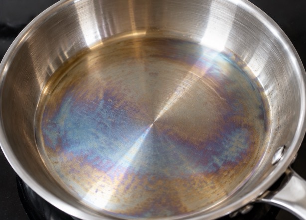 How to Clean a Burnt Stainless Steel Pan: 5 Easy Methods 5 Rainbow heat discoloration inside a stainless steel pan